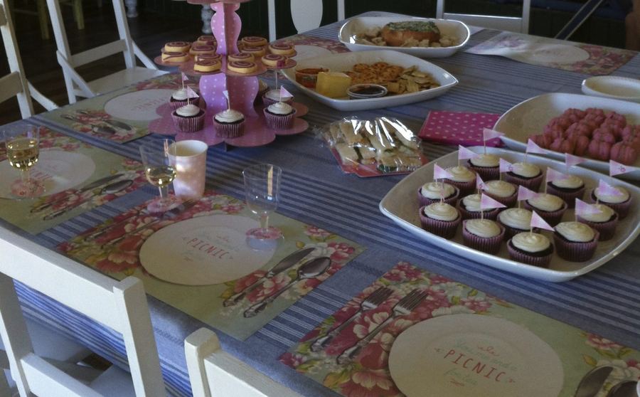 A party table in the clubhouse, honour boards on the wall behind